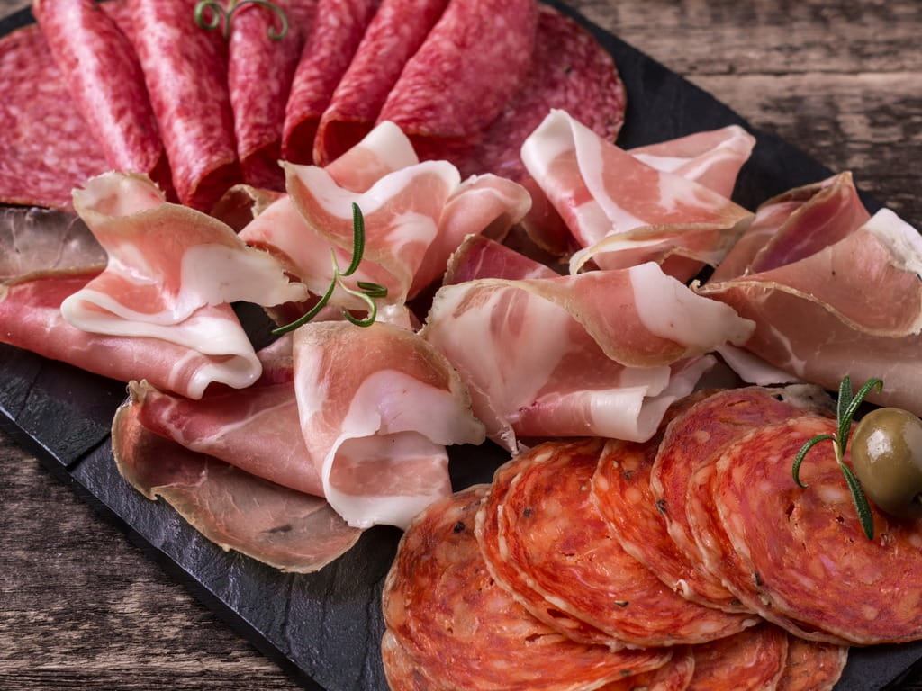 board of ham, bacon and sliced sausage